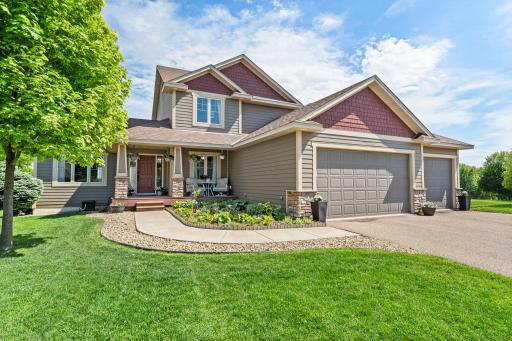 Welcome home to this gorgeous New Prague GEM! Beautiful landscaping, concrete sidewalk to cozy, front porch. Stand out curb appeal, nicely landscaped yard and new roof!