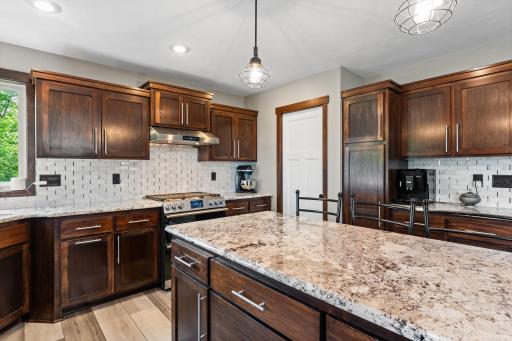 Upgraded Luxury Granite Countertops and Stainless Steel 'Smart' appliances. Solid wood, custom cabinetry throughout with soft-close doors and drawers.