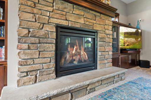 Sit back and relax next to this beautiful stone gas fireplace!