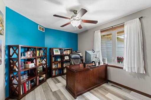 Main level office with beautiful LVP flooring.