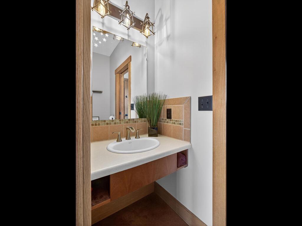 Perfectly positioned walk through half bath with pocket doors 34290 Lanesboro Ct North Branch MN 55056 USA-044-033-042-MLS_Size.jpg