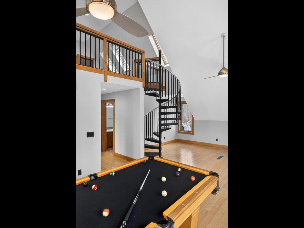 Vaulted Rec Room with easy access to back deck that overlooks the Sunrise River valley and the backyard paver patio 34290 Lanesboro Ct North Branch MN 55056 USA-072-062-070-MLS_Size.jpg