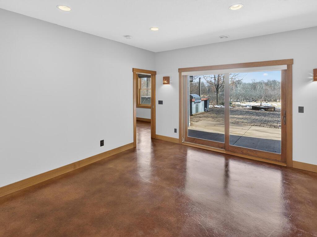 Main floor office with in floor heating and stained concrete accents 8' wide patio doors too! Covered porch area with tongue & groove ceilings 34290 Lanesboro Ct North Branch MN 55056 USA-041-064-040-MLS_Size.jpg