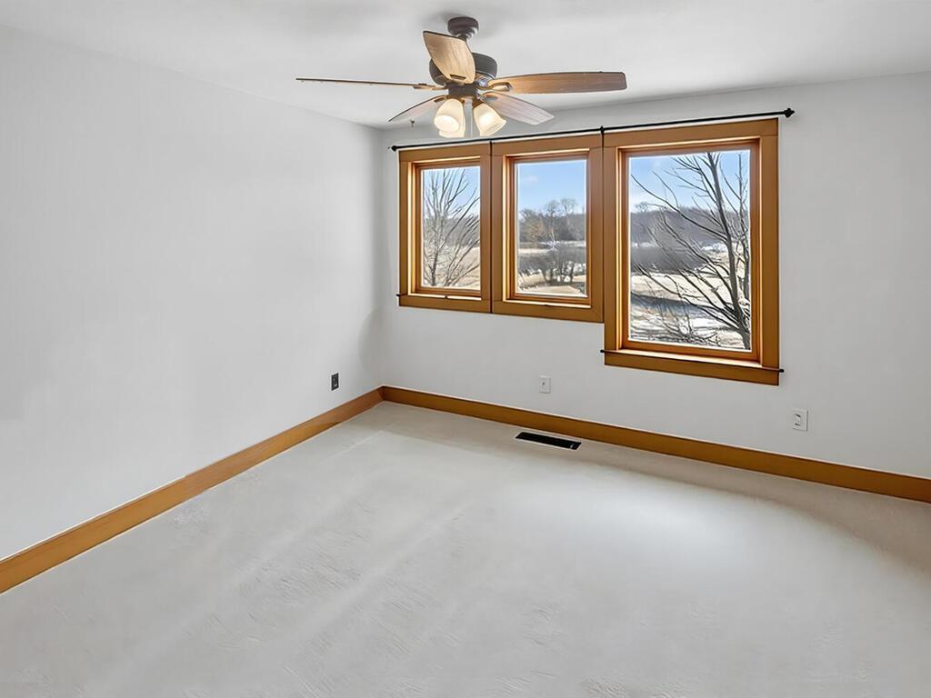 Bedroom 2 3with large river view windows 4290 Lanesboro Ct North Branch MN 55056 USA-060-003-058empty-MLS_Size.jpg