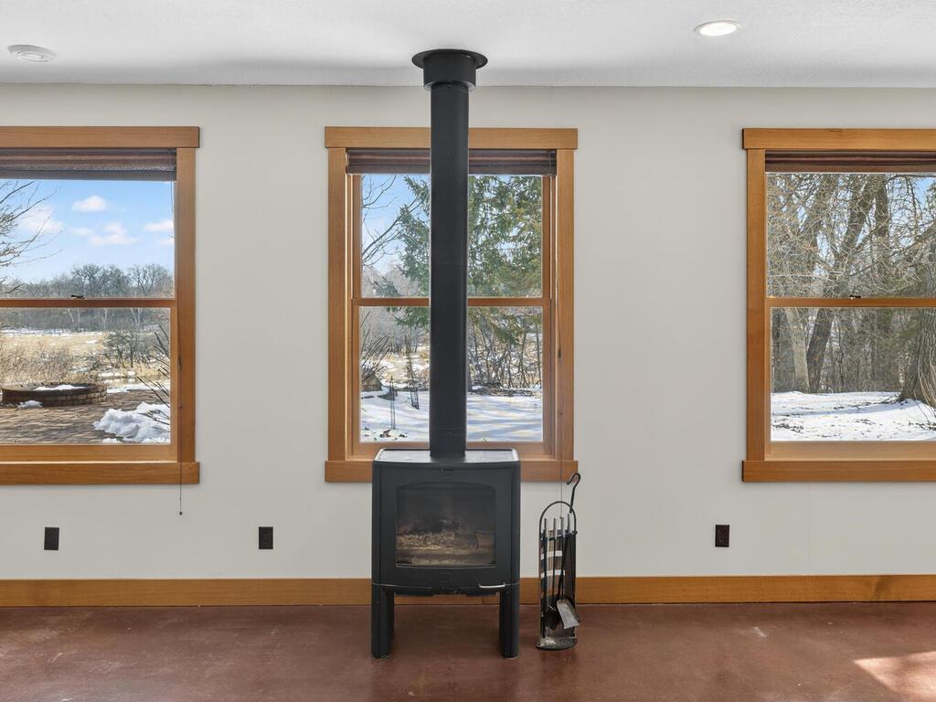 Main floor wood burning fireplace centrally located 34290 Lanesboro Ct North Branch MN 55056 USA-030-043-030-MLS_Size.jpg