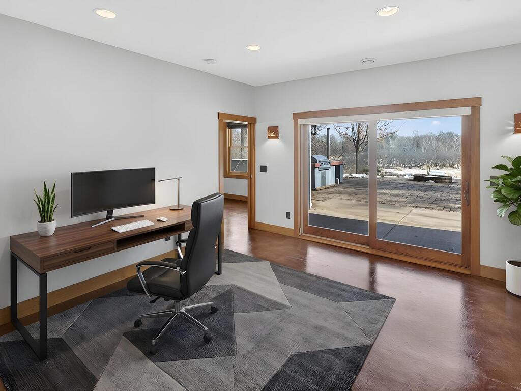 Main floor office suite with views of the backyard, virtually staged 34290 Lanesboro Ct North Branch MN 55056 USA-042-004-040staged-MLS_Size.jpg