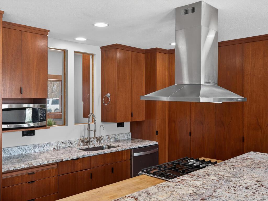 Bright Kitchen Space: Granite countertops, Butcher Block too Natural light enhances cooking and gathering 34290 Lanesboro Ct North Branch MN 55056 USA-034-029-033-MLS_Size.jpg