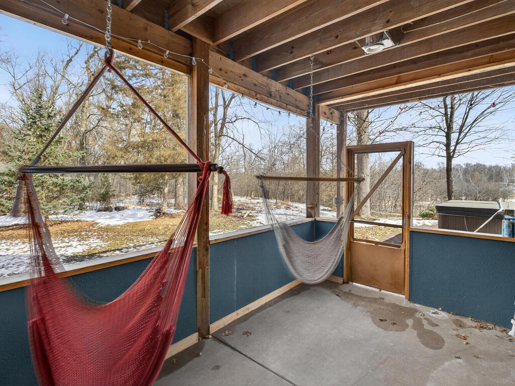 Screened side patio with swings and door to hot tub and paver patio 34290 Lanesboro Ct North Branch MN 55056 USA-053-054-051-MLS_Size.jpg