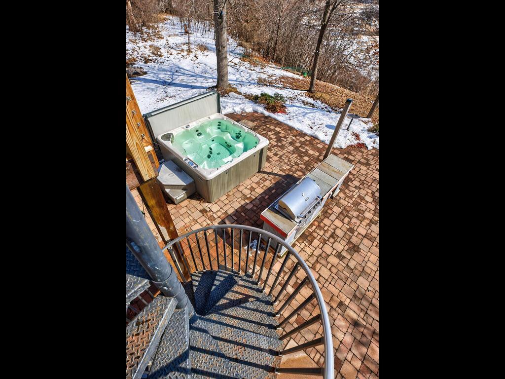 One of 2 spiral staircases PLUS Hot Tub Experience: Six person hot tub surrounded by nature 34290 Lanesboro Ct North Branch MN 55056 USA-017-031-018-MLS_Size.jpg