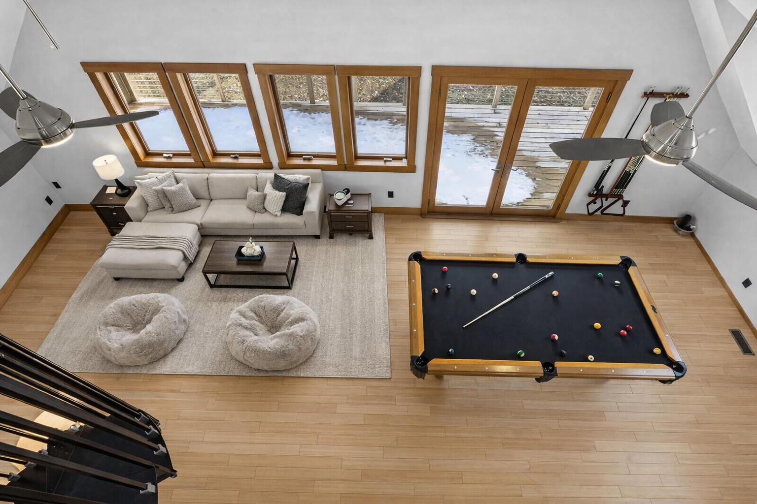 Mezzanine Level View: Overlooks Rec Room area Rec Room with furniture.png