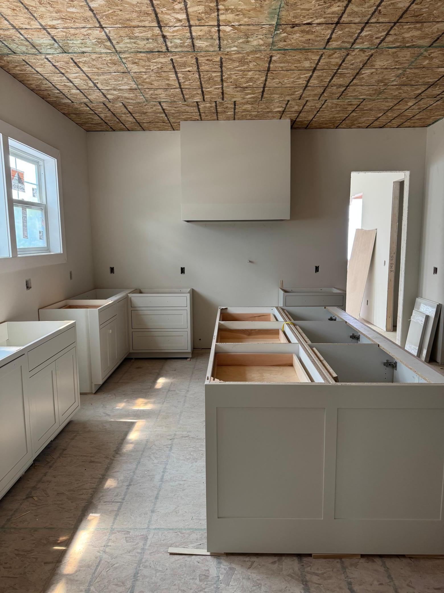 Custom inset cabinetry throughout the entire home. Oversized island, Thermador Appliances