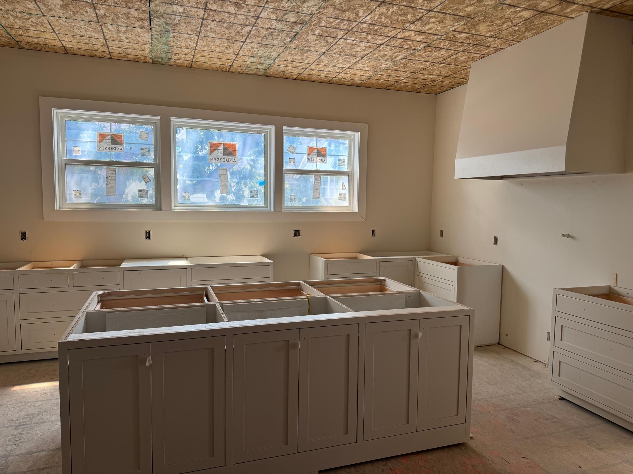 Custom inset cabinetry throughout the entire home. Oversized island, Thermador Appliances