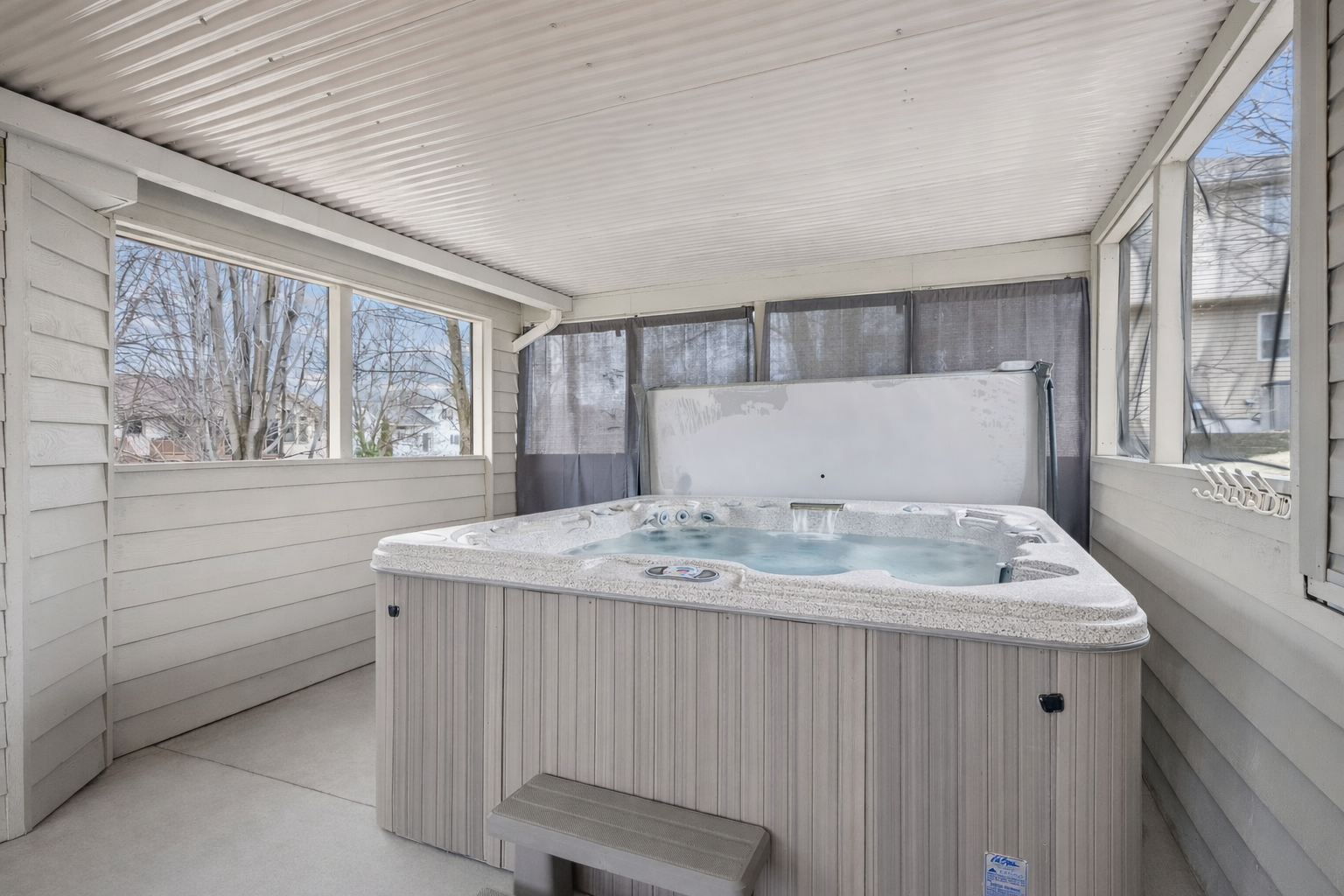 Hot Tub in screened in porch