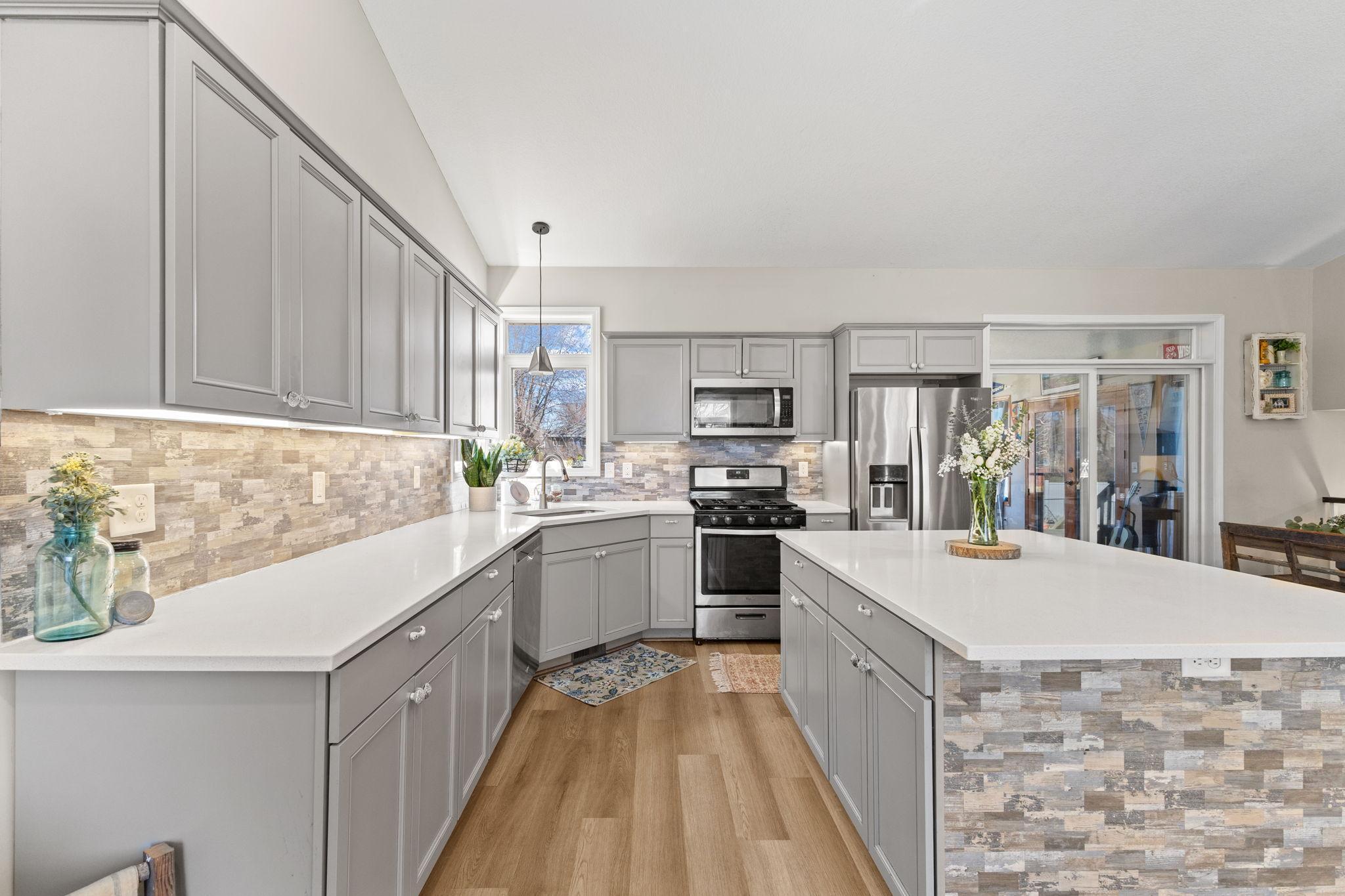 Stainless steel appliances create a clean, cohesive look that is easy to maintain.