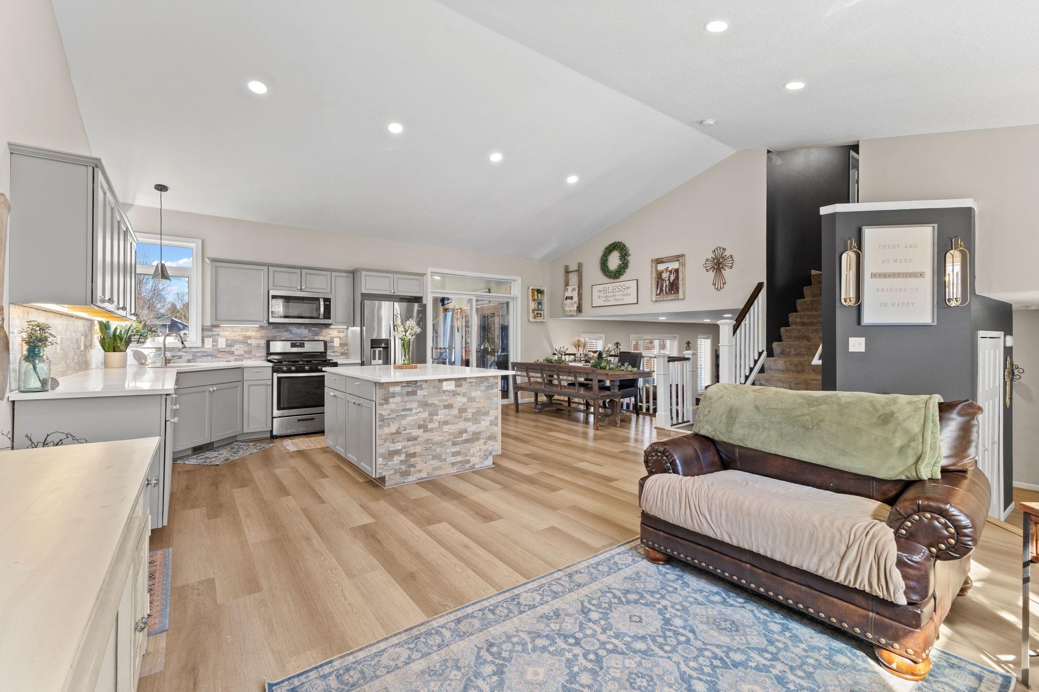 Soaring vaulted ceilings, recessed lighting, and large windows ensure and bright and airy living space.