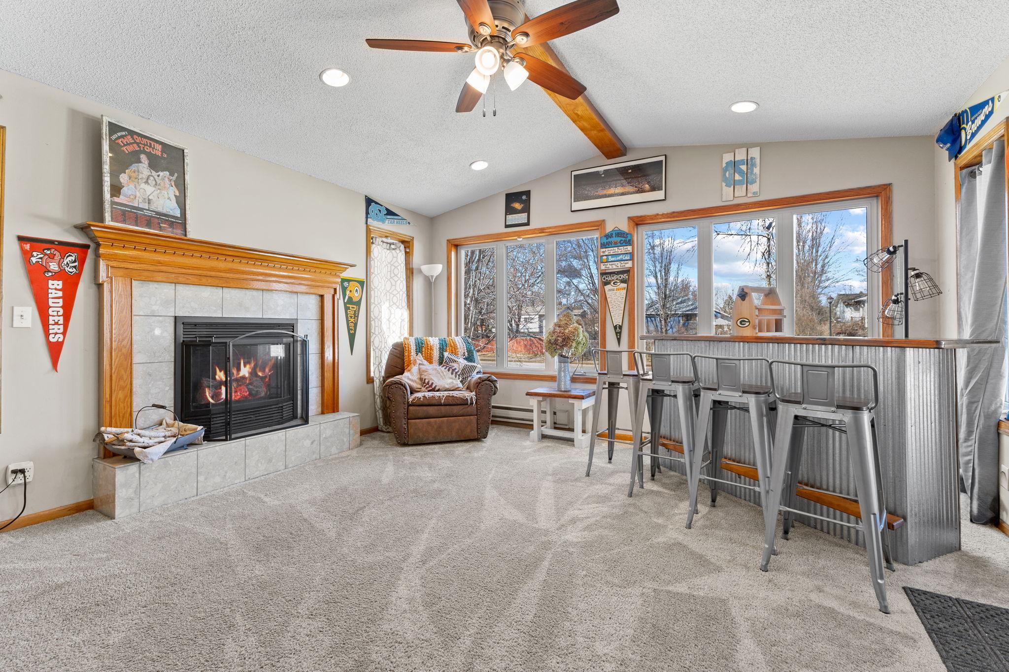 Complete with a cozy fireplace and walk-out to your deck and backyard!