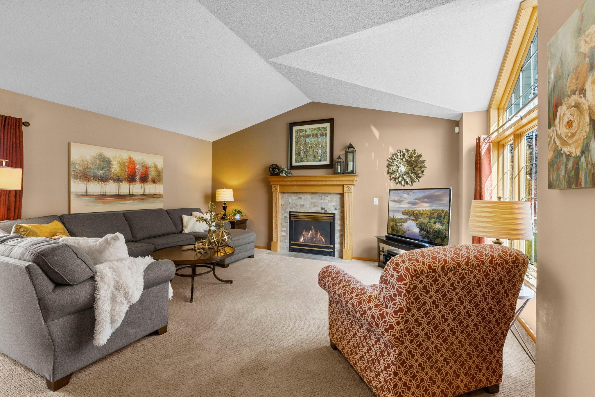 Living Room, with a gas fireplace and picture window, 20585 Georgia Ave Pl N