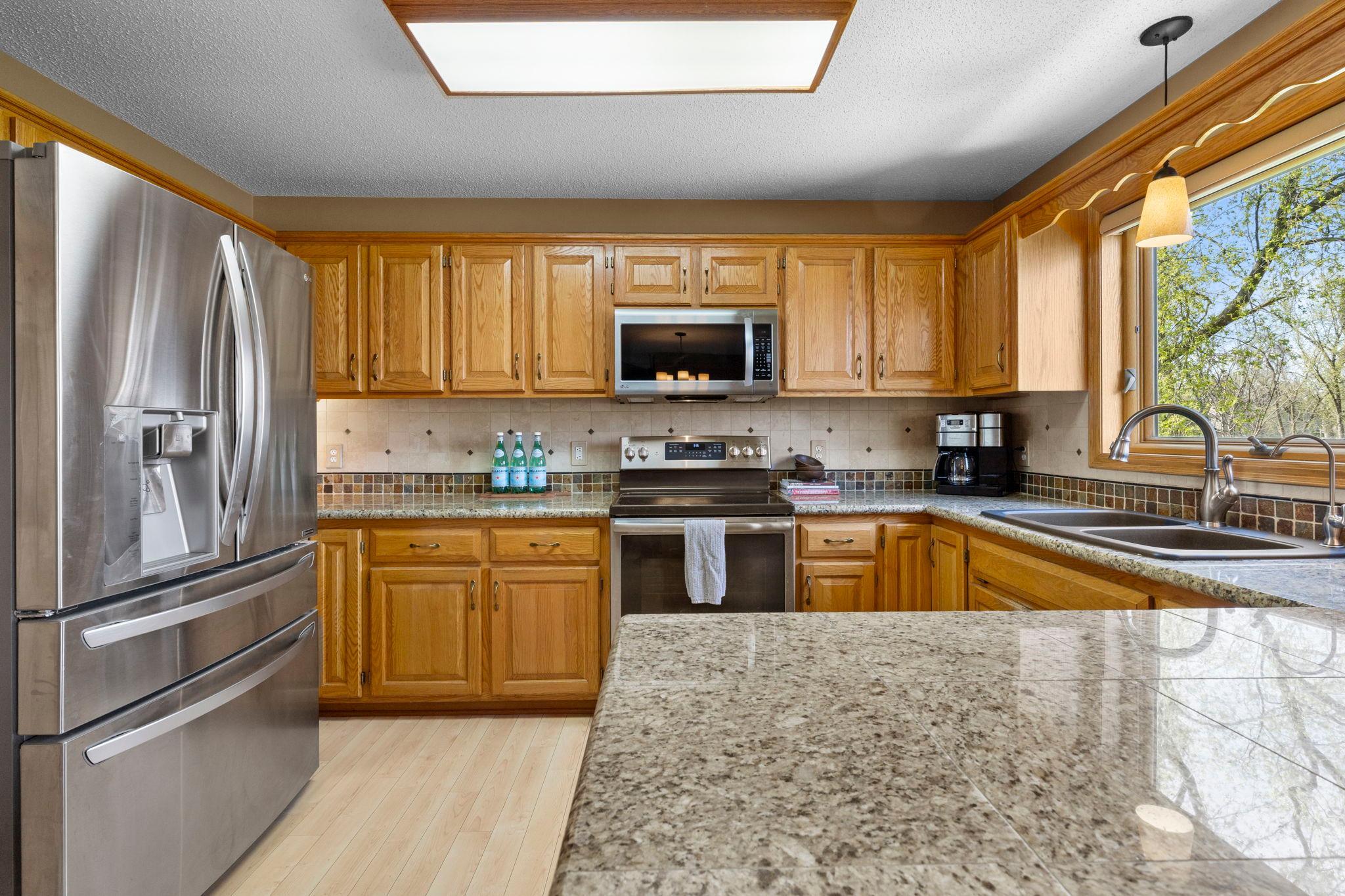 Gleaming woodwork and kitchen window, 20585 Georgia Avenue Place N
