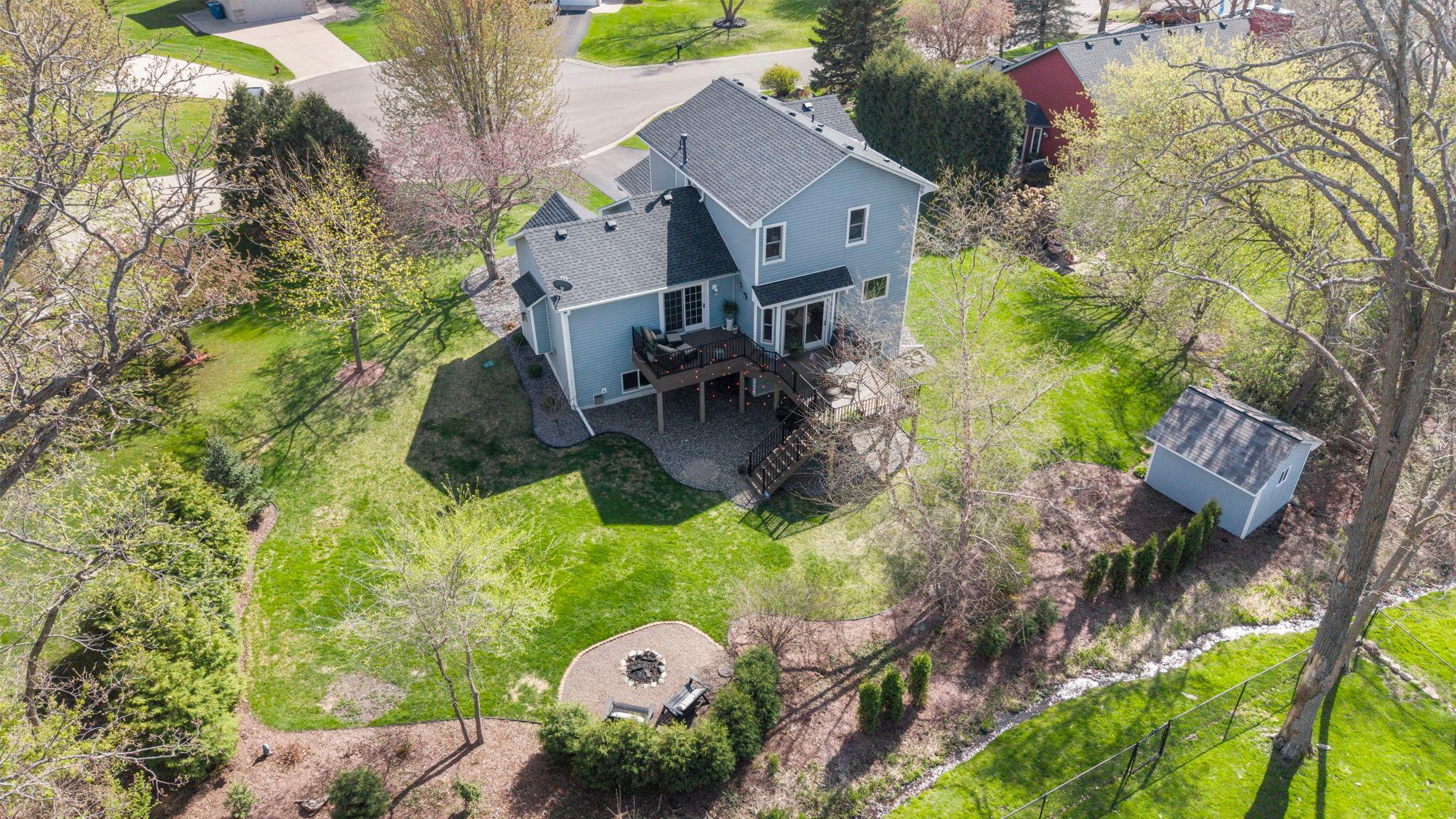 Aerial view of the gorgeous backyard of 20585 Georgia Ave Pl N