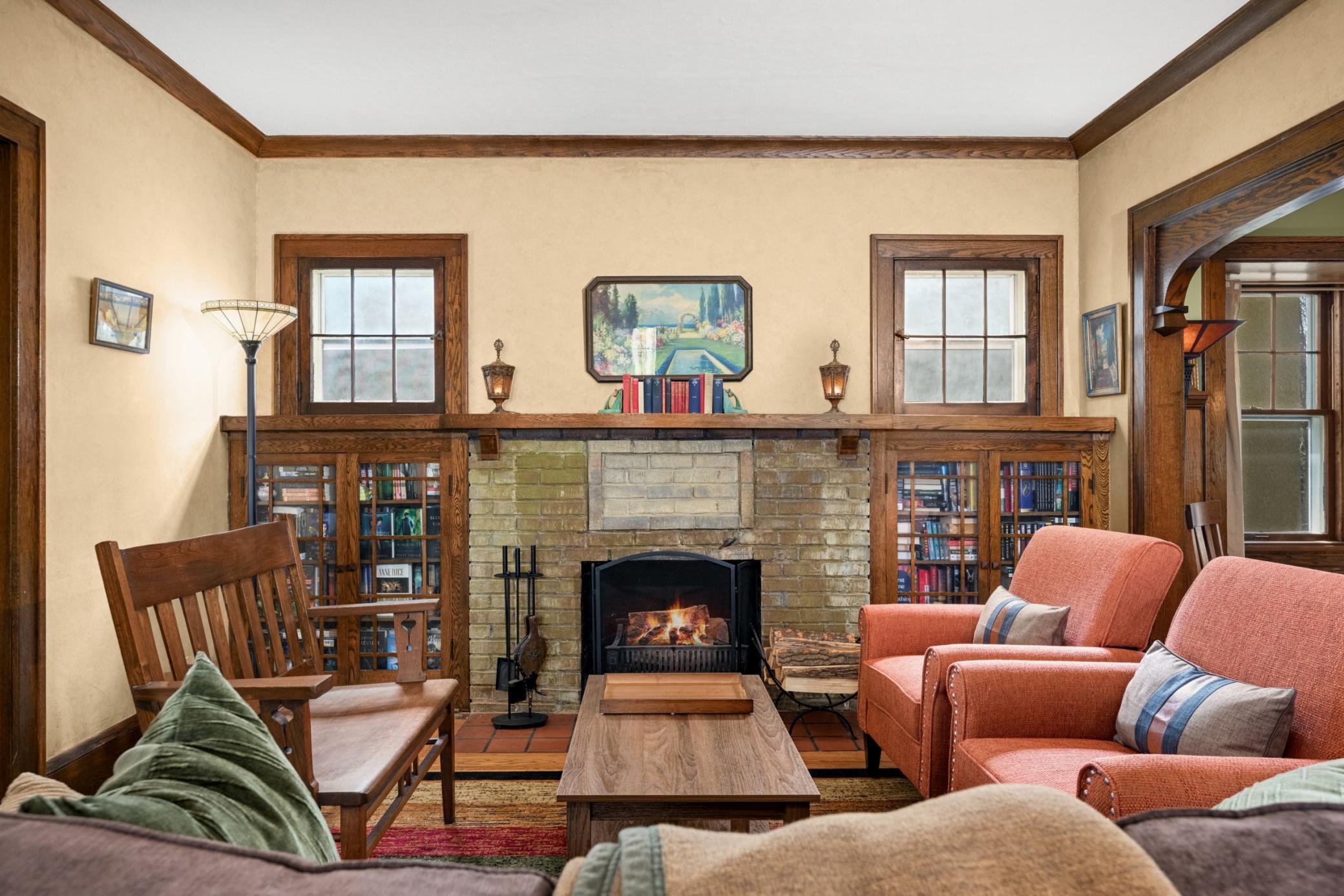 Wood burning fireplace with original built ins