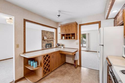 It connects seamlessly with the dining area and the rest of the upper level.
