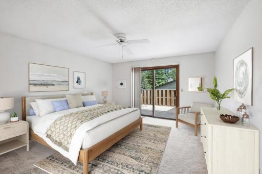 The virtually staged large primary bedroom.