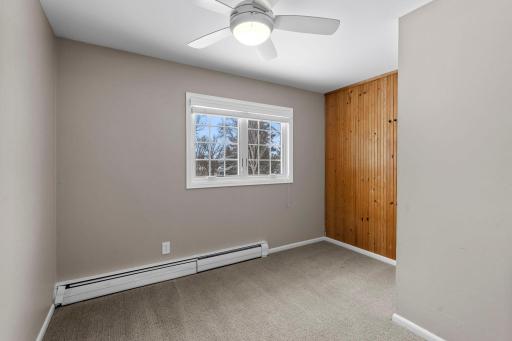 Front facing 4th bedroom is nicely positioned for a Home Office and has closet, Updated Window, Lighting, Trim, Doors plus an accent wall.