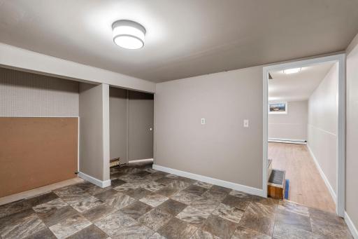 Extra Room is finished and provides options for Storage or Home Gym.