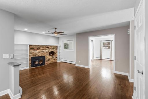 Gleaming Hardwood Floors, updated Trim, Lighting, Windows and Doors!