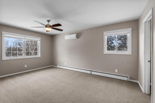 Primary Bedroom includes 2 Newer Windows, Ceiling Fan and AC Mini-split, part of the new AC system.