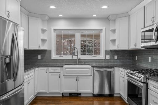 Fully Updated Kitchen was renovated about 7 years ago with New Cabinets, Granite C.tops, Tile Backsplash, Lighting and New Appliances.