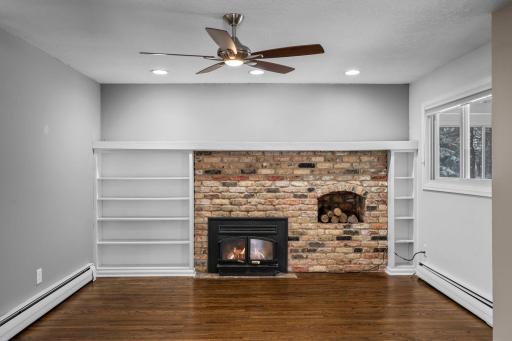 Cozy up by the original full brick fireplace in the main floor family room.