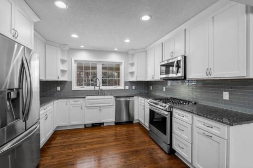 Farm House Sink, Newer Dual Windows overlooks Front Yard and Hardwood Flooring, Wow!