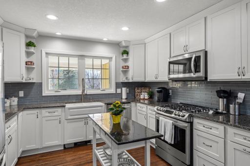 Sure to Please the Chef in the Family! Note small center island is free standing table and not included.
