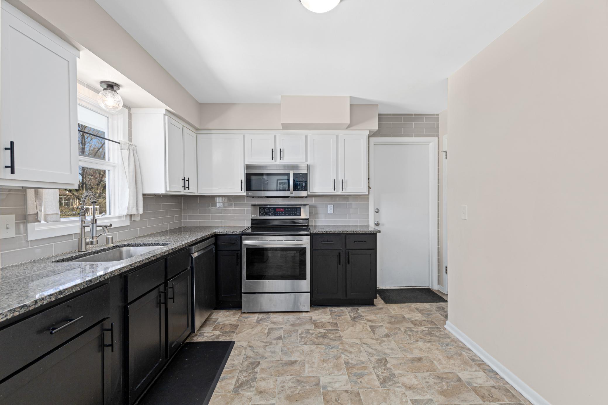Kitchen with access to the garage and basement