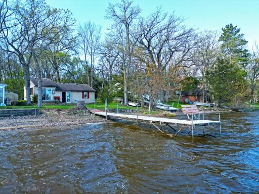 Step onto your private dock and take in the tranquil beauty of Big Elk Lake - dock will stay with the cabin.