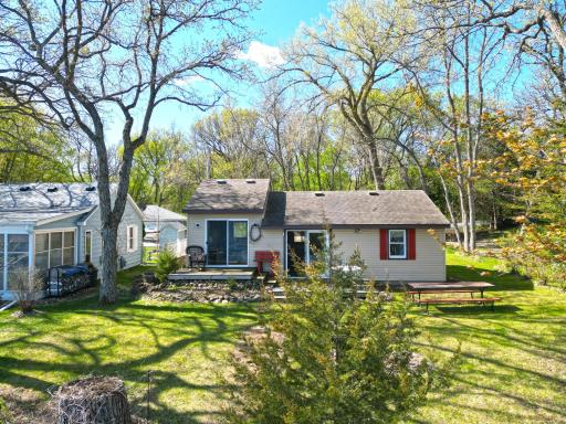 This updated retreat offers stunning views from nearly every room and features two spacious lakeside decks.