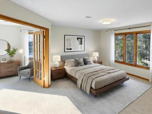 The ensuite primary bedroom has a private and relaxing view for all seasons! All carpets in the home are brand new and walls are freshly painted. Glass-paned French doors reveal a charming loft sitting room overlooking the Great Room. Virtual staged
