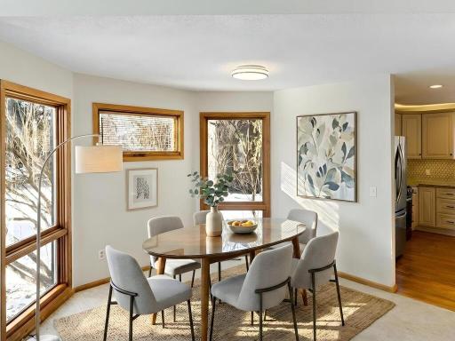 Open to the Great Room, the dining area can be expanded to accommodate a larger group. Taken together , these are spaces that shall be used by the owners and enjoyed by their guests. Virtually staged.