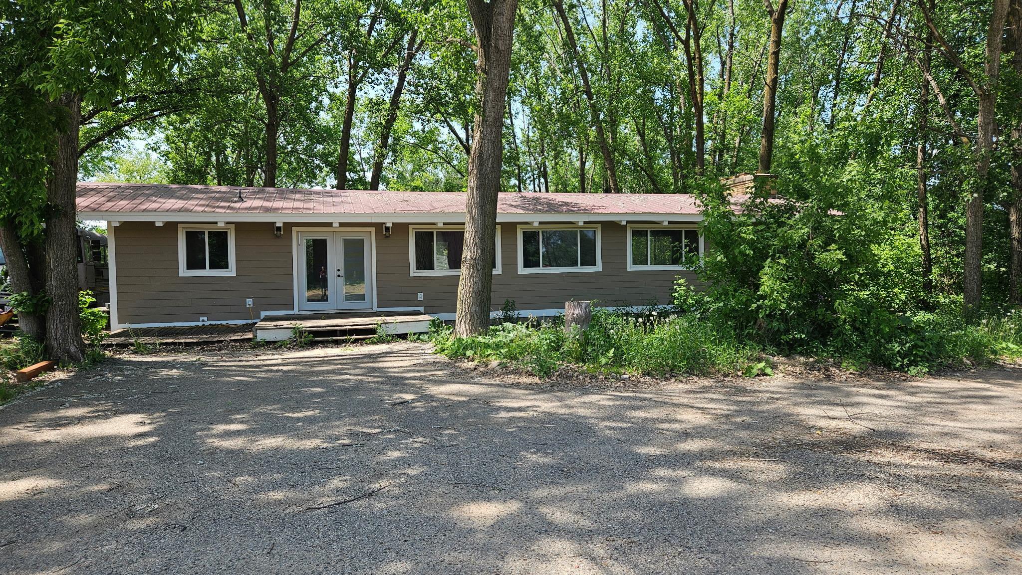7025275