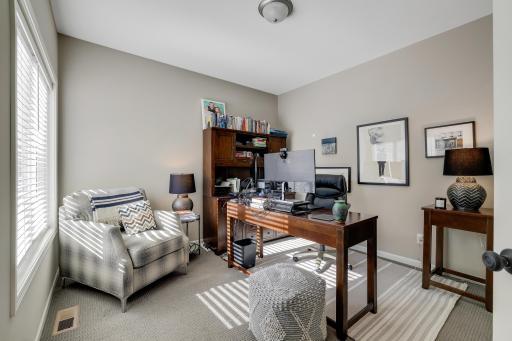 The office resides at the front of the home and can also function as a 4th bedroom.