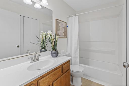 Updated bathroom with new tops and lighting.