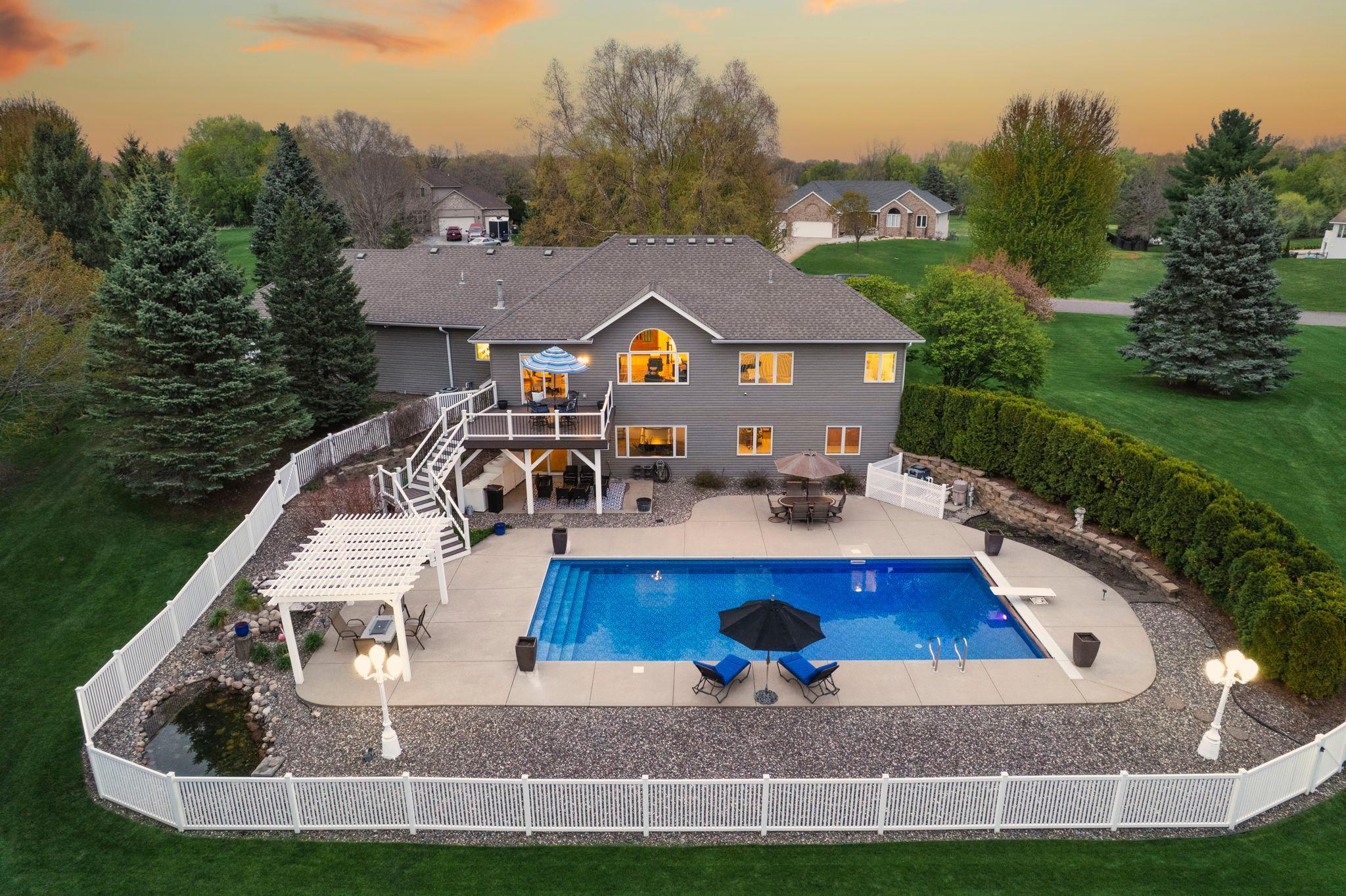 Nestled on a quiet cul-de-sac, this home offers a private setting with wooded views out back and the golf course located just across the street.