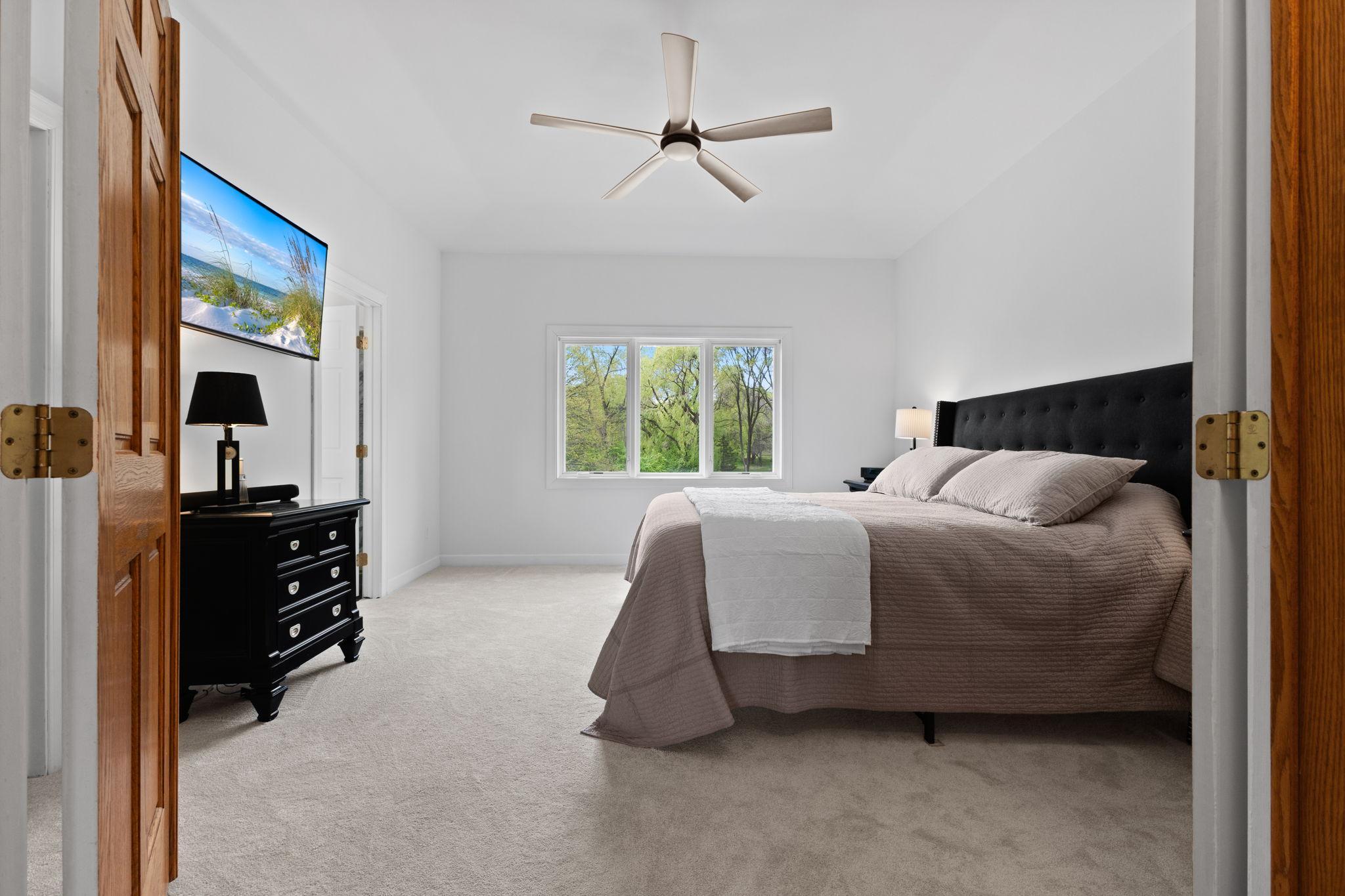 Retreat to the owner's suite designed for ultimate comfort and privacy.