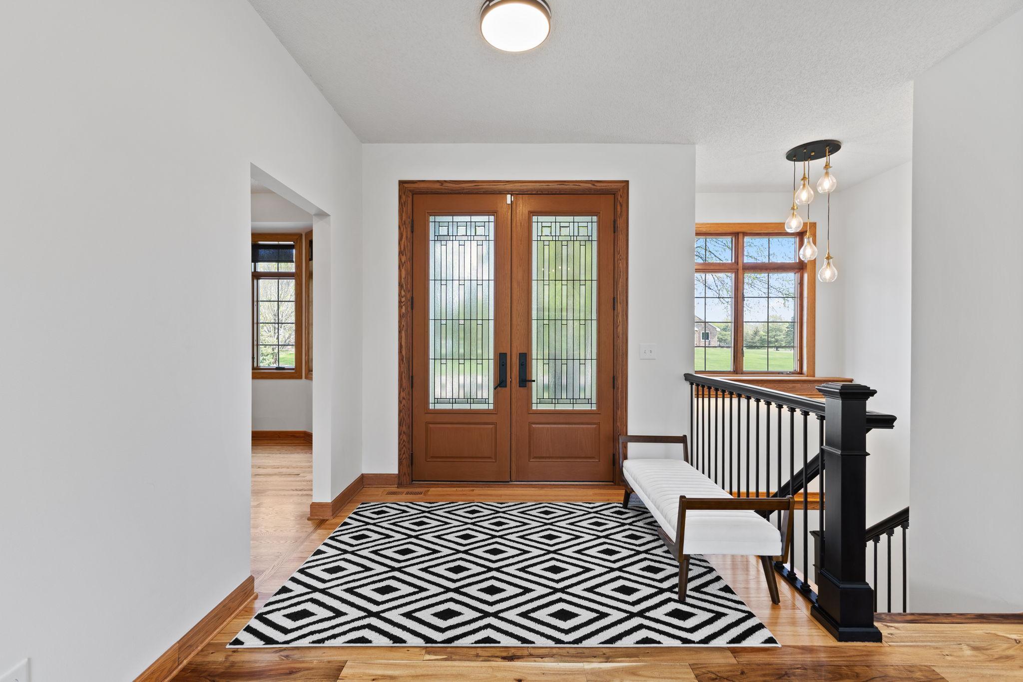Greet guests with ease in the spacious foyer, designed to provide a warm welcome without feeling crowded.