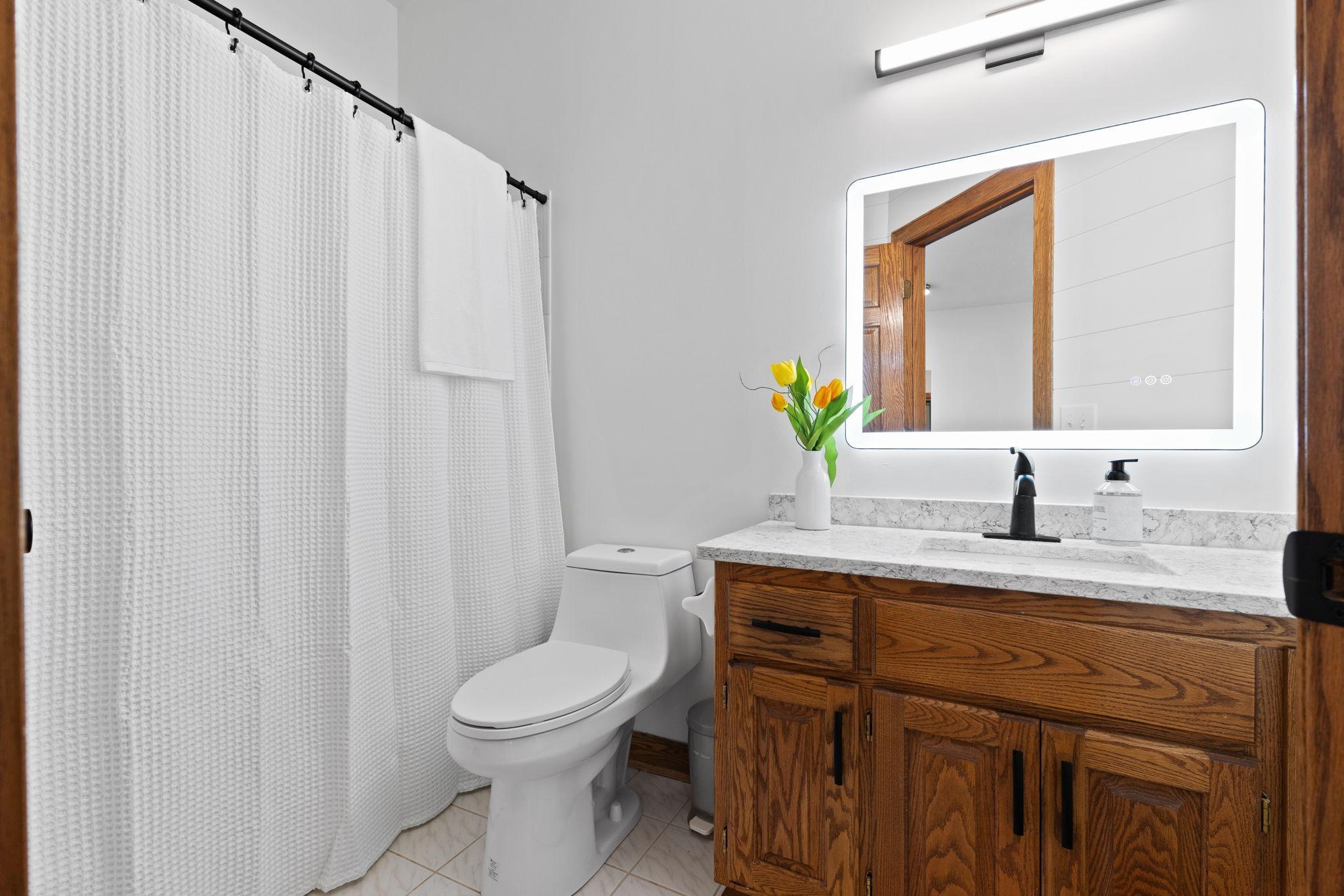 The main level full bath is convenient to all living spaces making it ideal for guests and everyday use.