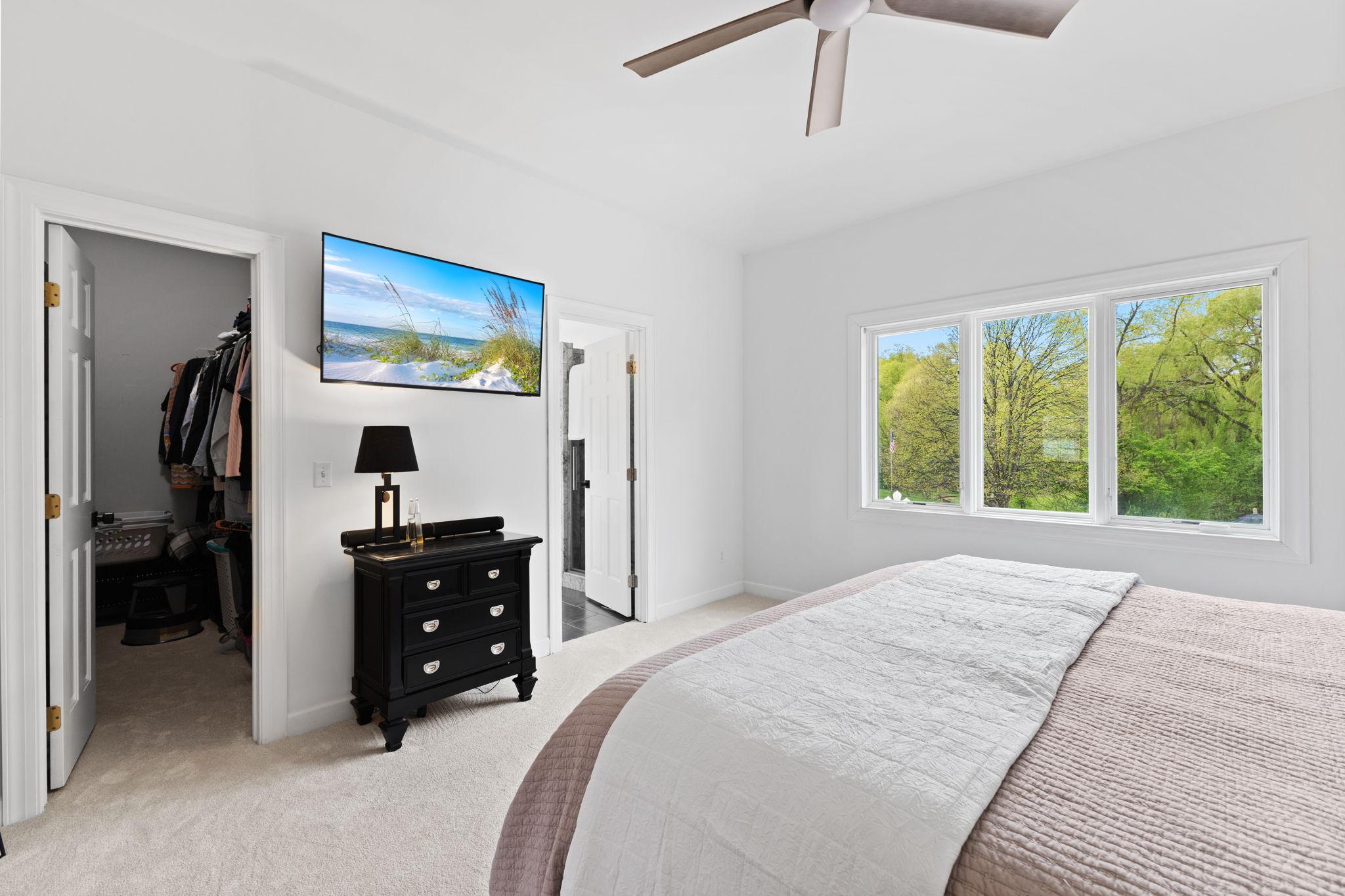The primary suite also has a large walk-in closet and private full ensuite.