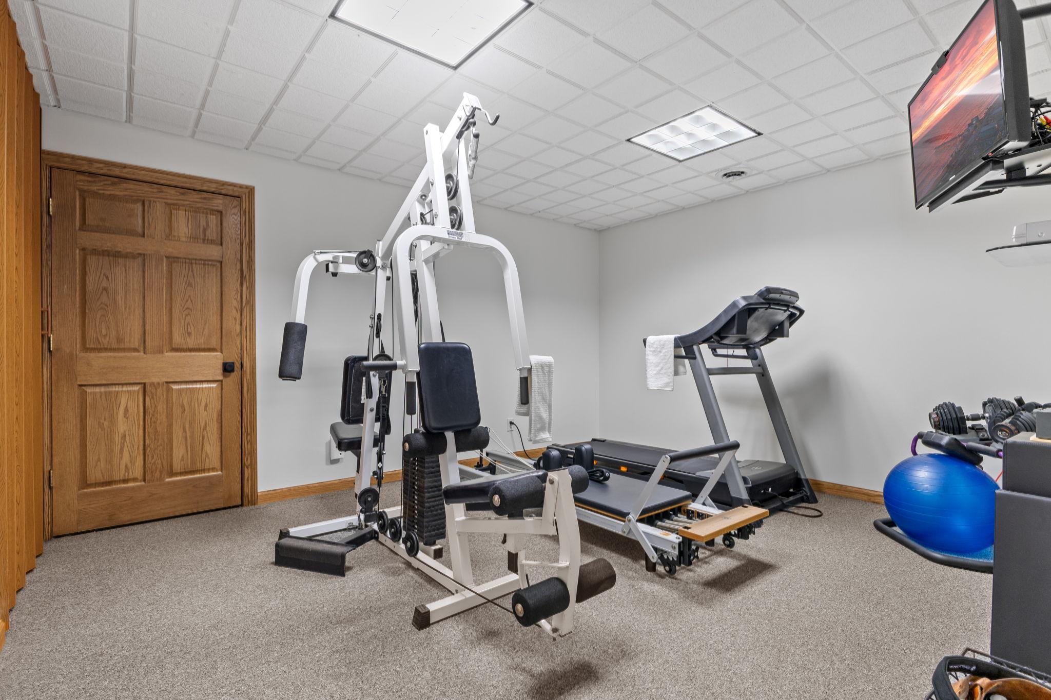 The workout room offers flexible space that can easily function as a home gym, hobby room, office, or whatever best fits your lifestyle needs.