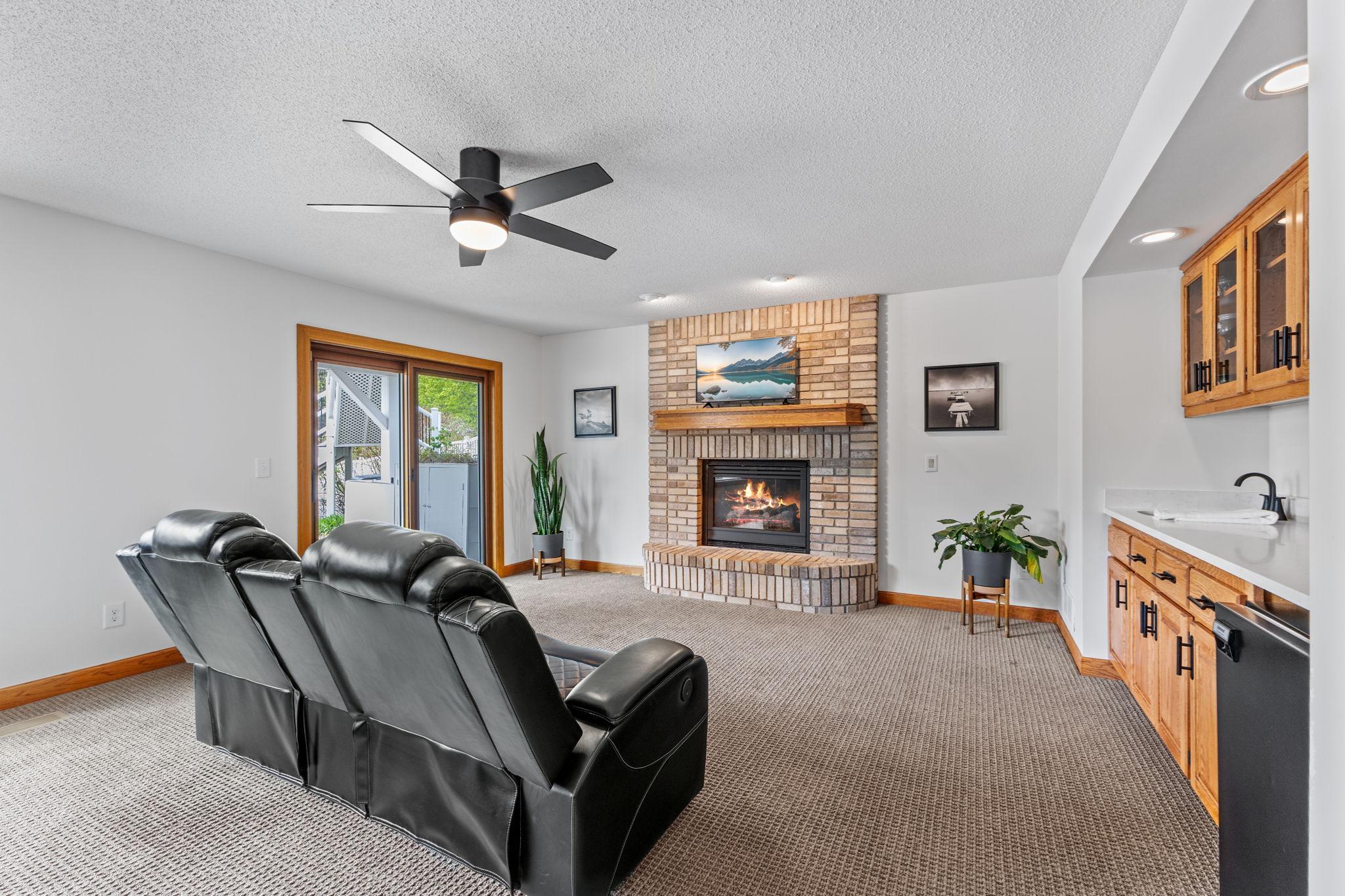 Complete with a gas fireplace and wet bar!