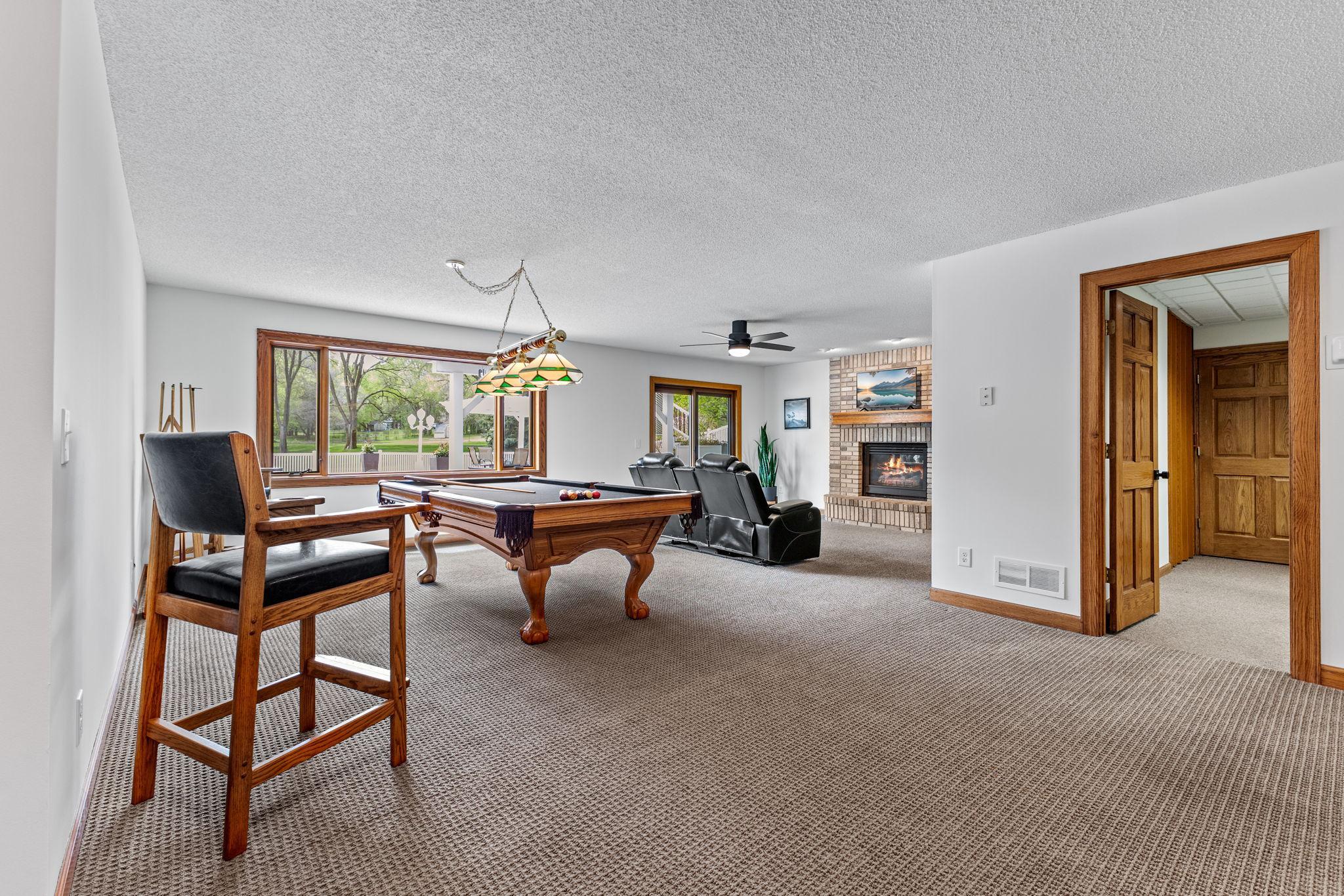 The finished walk-out lower level extends your living and entertaining space with added flexibility and comfort.